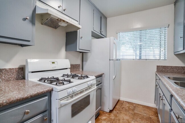 Building Photo - Gated, Mid-Century Multi-Family Property near Metro Access and Victoria Park