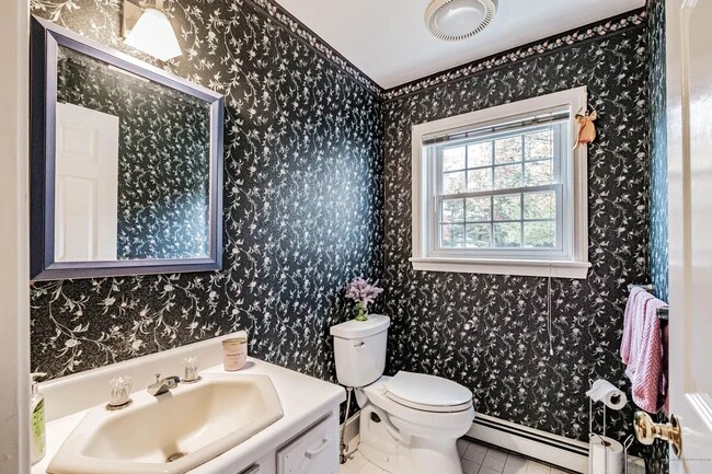 1st floor half bath - 9 Lupine Ct