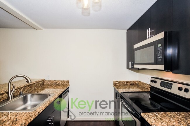 Building Photo - Modern 2-Bedroom Retreat with Balcony in C...