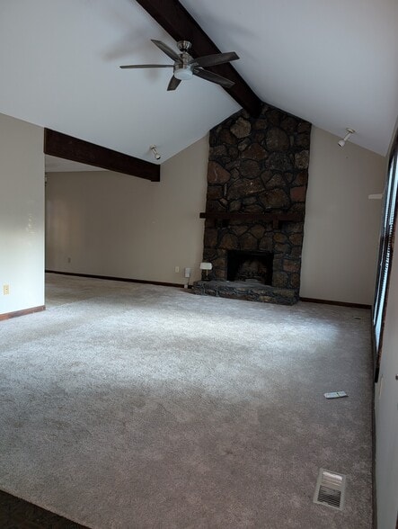 Cathedral ceiling front room, fireplace view - 2456 Burgundy Dr