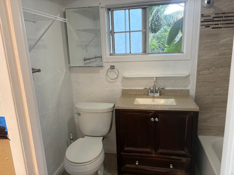 Lower level only bathroom off kitchen and living room - 2424 Jefferson St