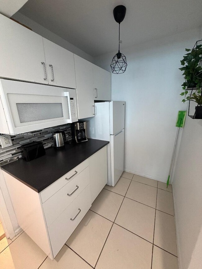 Building Photo - 5445 Collins Ave