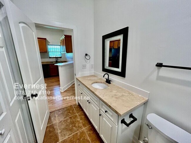 Building Photo - Spacious 4-Bedroom Home with Front Porch a...