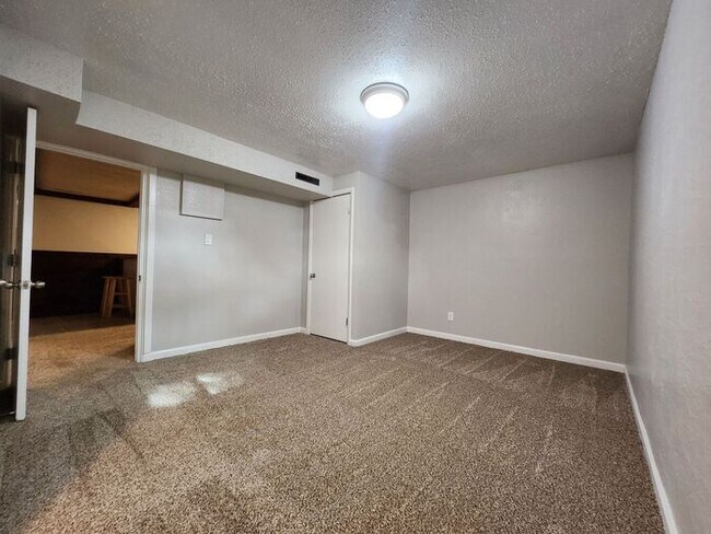 Building Photo - Move-In Ready 5-Bedroom Gem – Enjoy 50% Of...