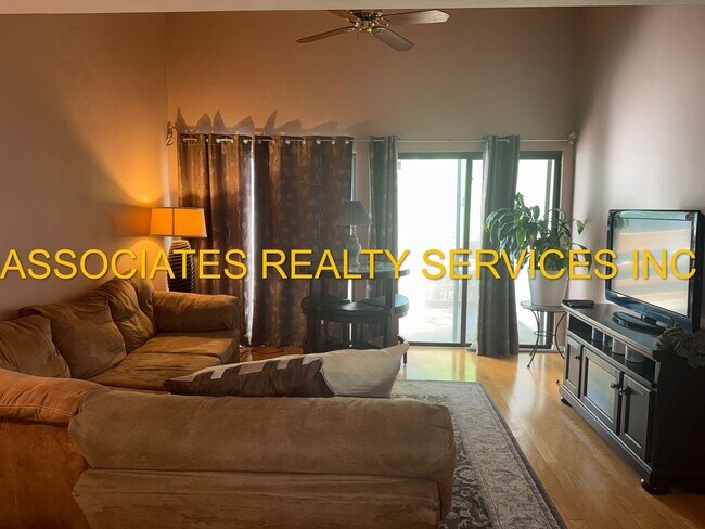 Primary Photo - Partially Furnished 2-Bedroom Condo with D...