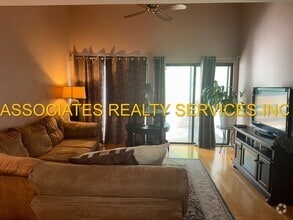 Building Photo - Partially Furnished 2-Bedroom Condo with D...