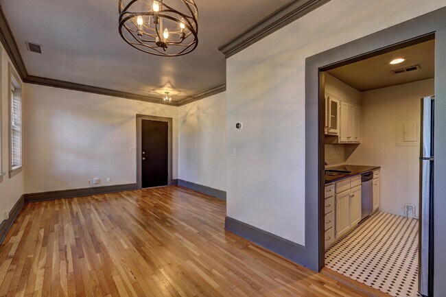 Living area looking to entrance door - 1 S Prado NE