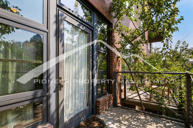 Building Photo - Modern Industrial Condo Downtown with Park...