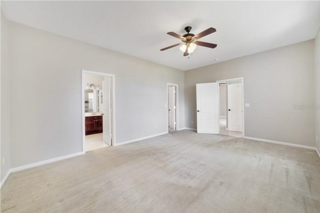 Building Photo - Stunning 5/2.5 Spacious Home with a 3 Car ...