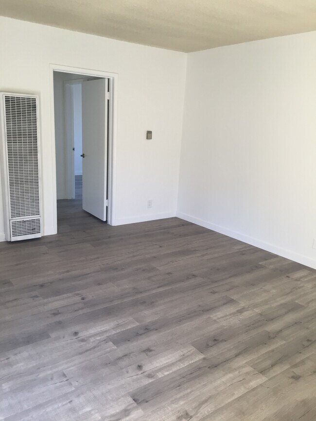 Actual living room before staging - 1611 Brockton Ave