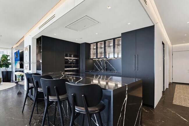 Building Photo - 5875 Collins Ave