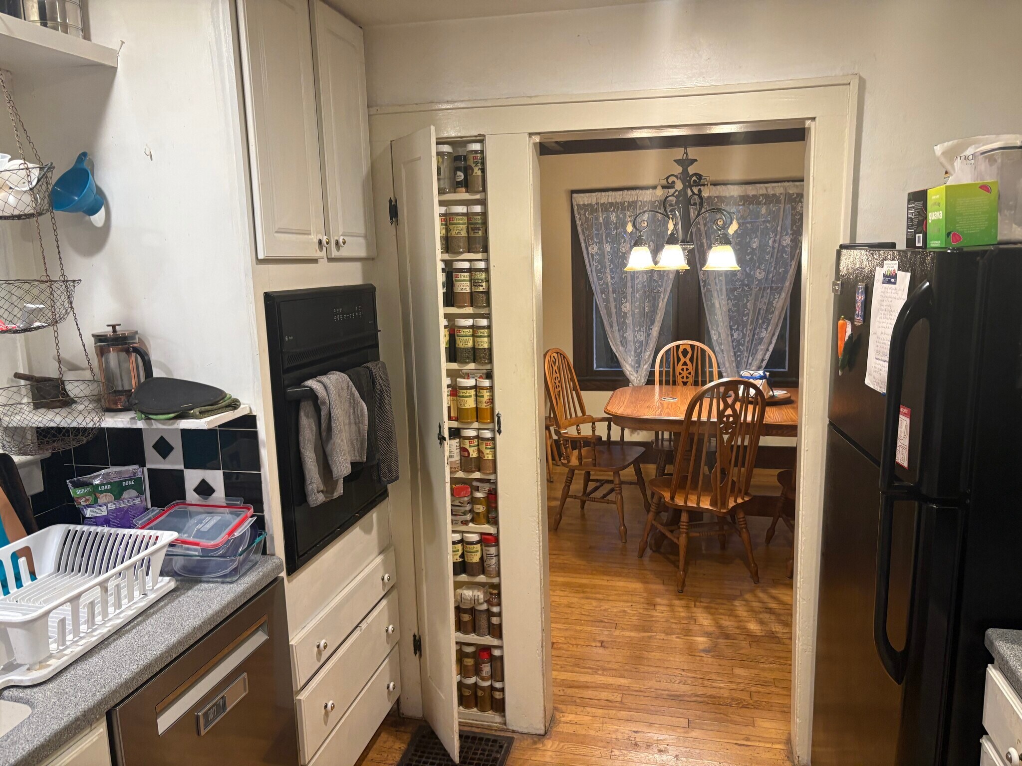 Kitchen to Dining view with spice cupboard - 117 Linden Ave