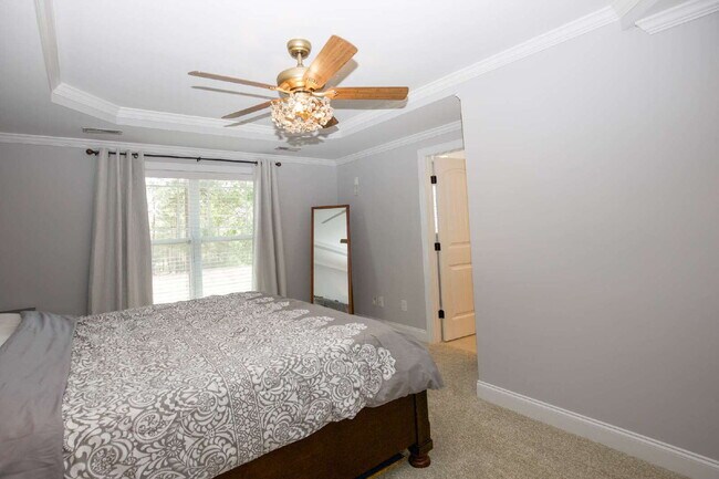 Building Photo - "Spacious 4-Bedroom Gem with 2.5 Baths at ...