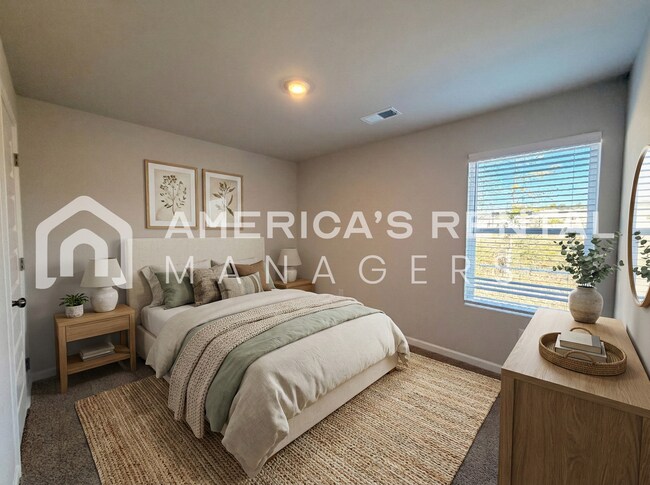 Building Photo - Spacious Two-Story Townhome with Open Layout!