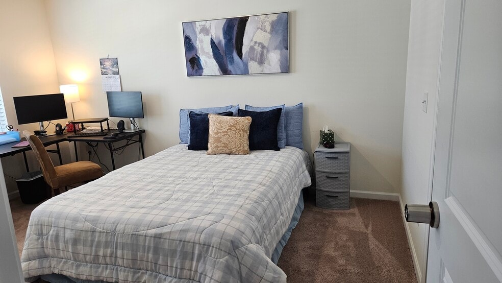 Master Bedroom with desk. Monitors not included. Dresser, Nightstand & Mirror on order. - 1106 Saylors Pl