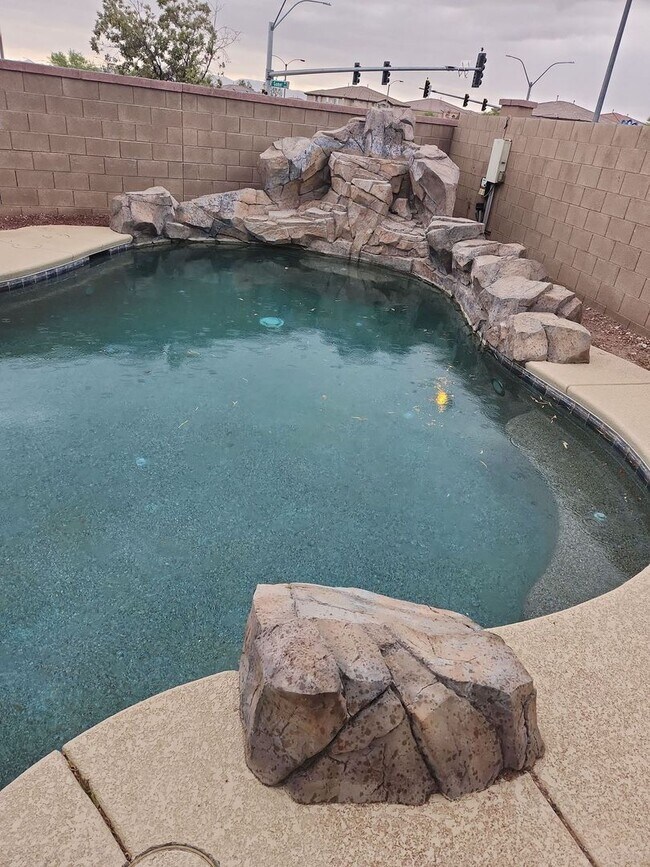 Building Photo - A Stunning 4 Bedroom Home with a Sparkling Pool
