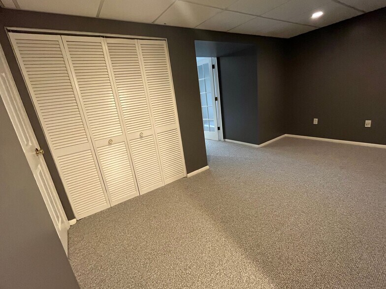 Basement Living Room - 9415 Riverbrink Ct