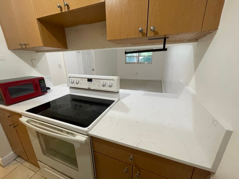 Kitchen to living room view - 665 NE 83rd Ter