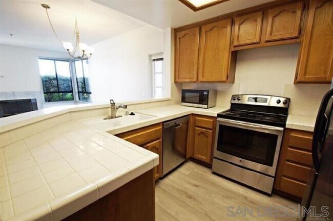 Building Photo - 5865 Friars Rd