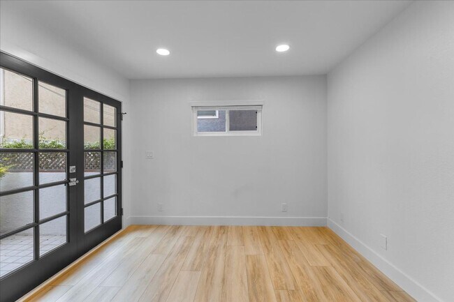 Building Photo - COMPLETELY REMODELED, BRIGHT & AIRY, TRI-LEVEL HOME W/ TOP-FLOOR GREAT ROOM LIVING SPACE, 2-CAR G...