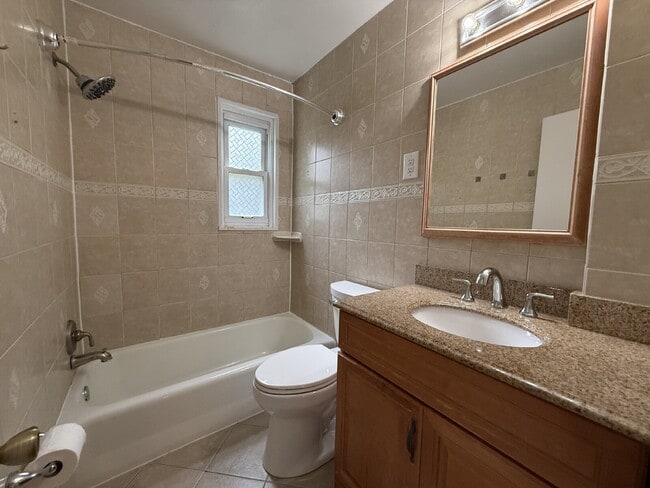 Building Photo - Updated Duplex in Prime Location with Ample Outdoor Space