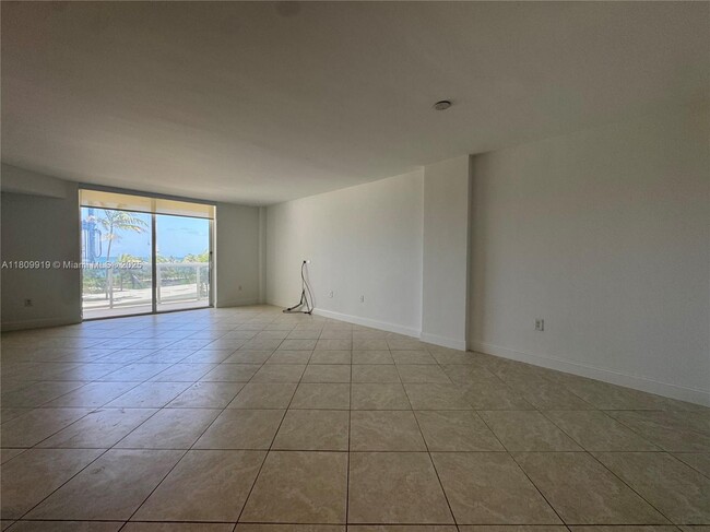 Building Photo - 10275 Collins Ave