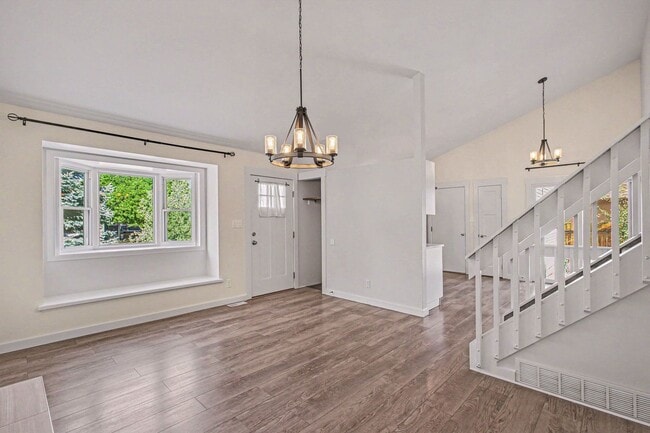 Building Photo - 3 bedroom, 2 car garage, fenced yard, updated and clean!