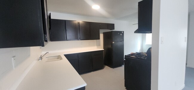 Building Photo - 6940 Hopkins Dr