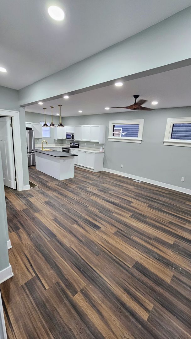 Building Photo - Stunning Renovation Ready for Your Finishing Touches!