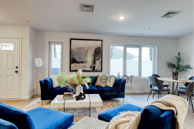 Building Photo - Modern New Construction 2 Bedroom Townhome with Garage & Driveway — First Occupancy!