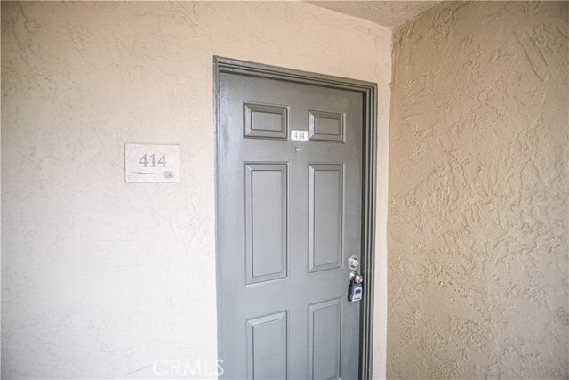 Building Photo - 7565 Charmant Dr