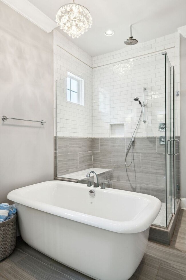 Building Photo - Welcome to this beautifully designed 4-bed...