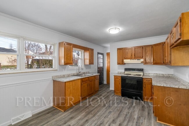 Building Photo - 3812 Root Ave NE