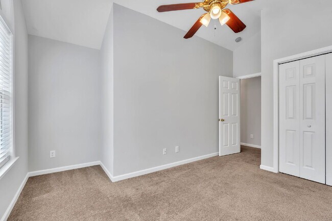 Building Photo - Beautifully Appointed 4BR Home Featuring a Screened Porch, Spacious Living Areas & Community Pool...