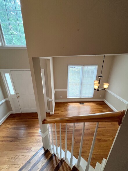 Upstairs view of downstairs/formal dining room - 8601 Abbotsbury Ct