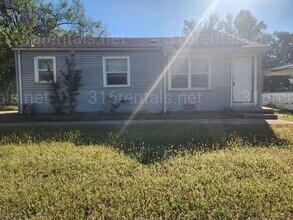 Building Photo - $1050 - 4 bedroom / 1 and a half bathroom ...