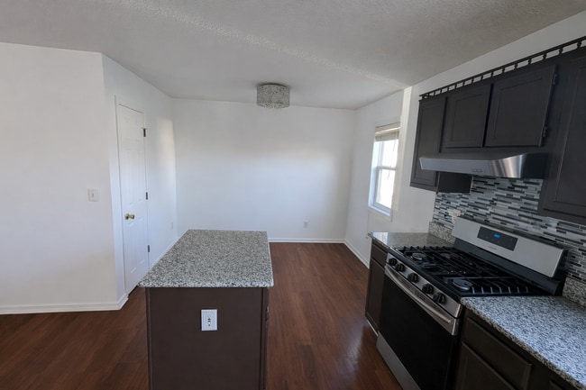 Building Photo - 6645 Queens Park Ave