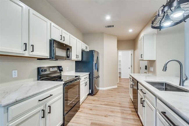 Building Photo - 9614 Magna Carta Loop