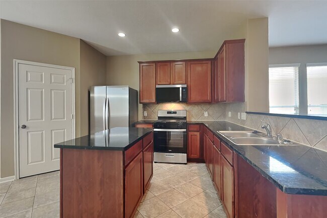 Building Photo - 7418 Jacobs Well Dr