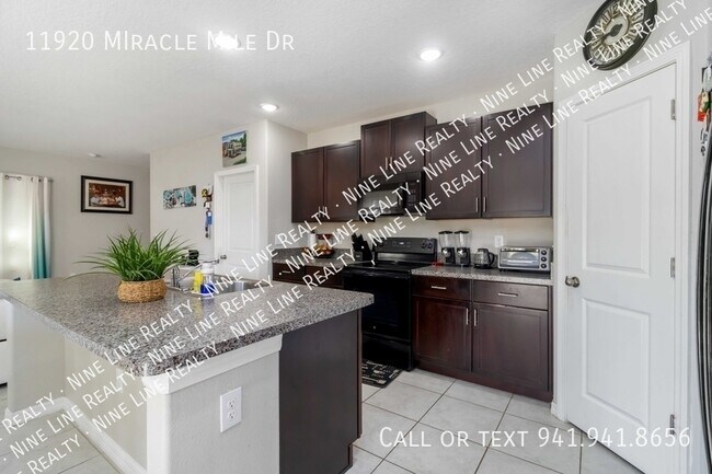 Building Photo - 11920 MIracle Mile Dr-