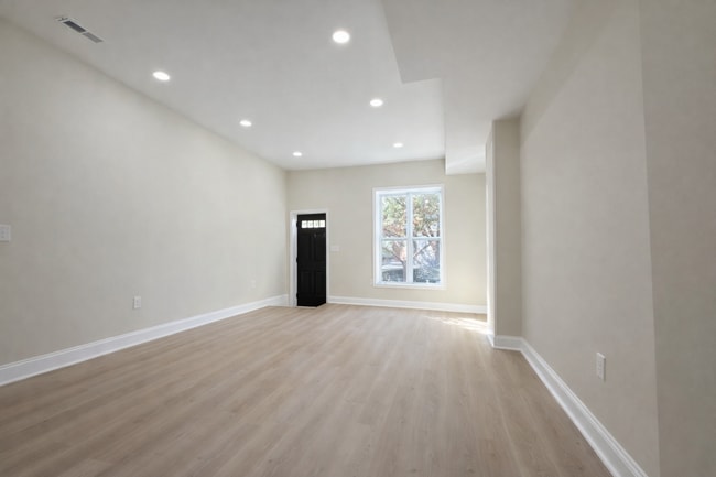 Building Photo - Modern 3BR Rowhome with Finished Lower Level & Rear Deck