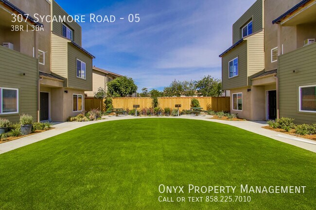 Building Photo - $1,000 off first month’s  rent! Newer Town...