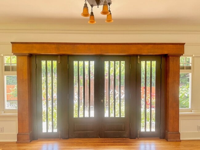 Building Photo - Meticulously Restored 1920s Craftsman on a Private, Hedged Lot | Pet Friendly!
