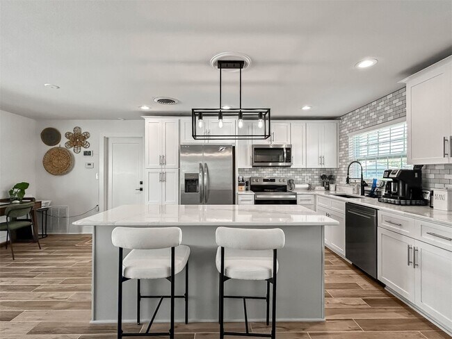 Building Photo - Waterfront Living with Pool – Fully Furnished & Turnkey! | 3bed | 2bath