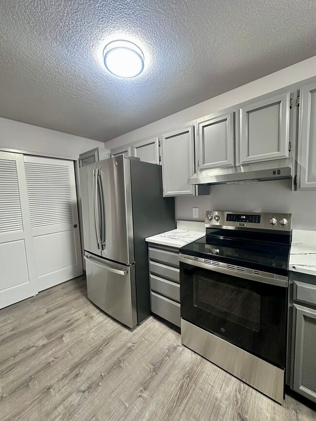 Building Photo - Charming & Spacious 3-Bedroom Duplex in the Heart of Highland!