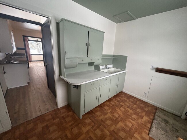 Building Photo - Bigfork Rodeo Farmhouse~ Fenced garden, greenhouse, garage, barn and shop!