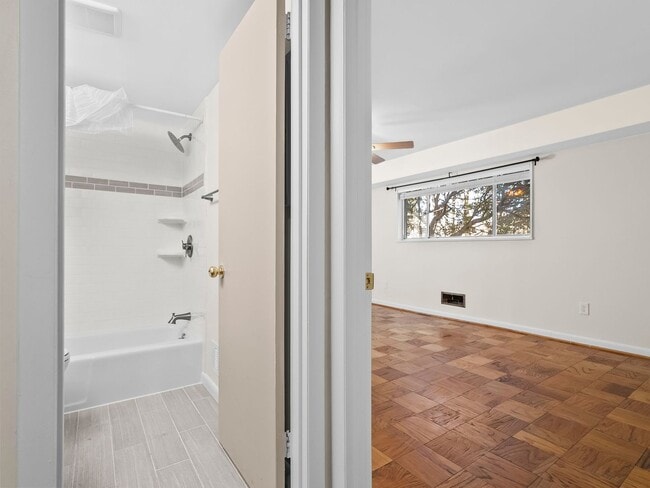 Building Photo - Commuter’s Dream! Large 2BR/2BA Condo Steps from Metro – All Utilities Included!