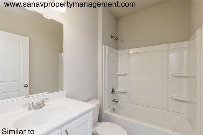 Building Photo - "Charming 2-Bedroom Home in Exclusive 36 W...