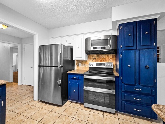 Building Photo - Coming Soon! 4 BR/2BA | Newly Renovated Single Family Home | 1-Car Garage Parking | Covered Patio...