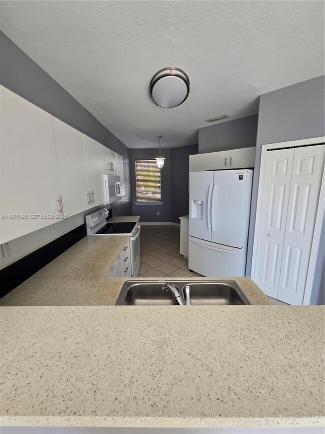 Building Photo - 5630 NW 107th Ave